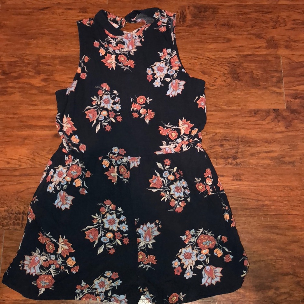Floral romper with high back cutout